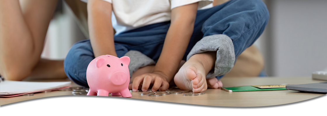 Child counting coins